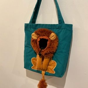 CANVASS SHOULDER LION PET CARRIER W/ ADJUSTABLE OPENING FOR PET HEAD & AIR FLOW.